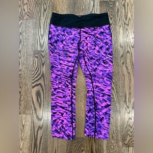 Nike DRI-FIT Women’s hot pink, purple, and black leggings with Black Waistband